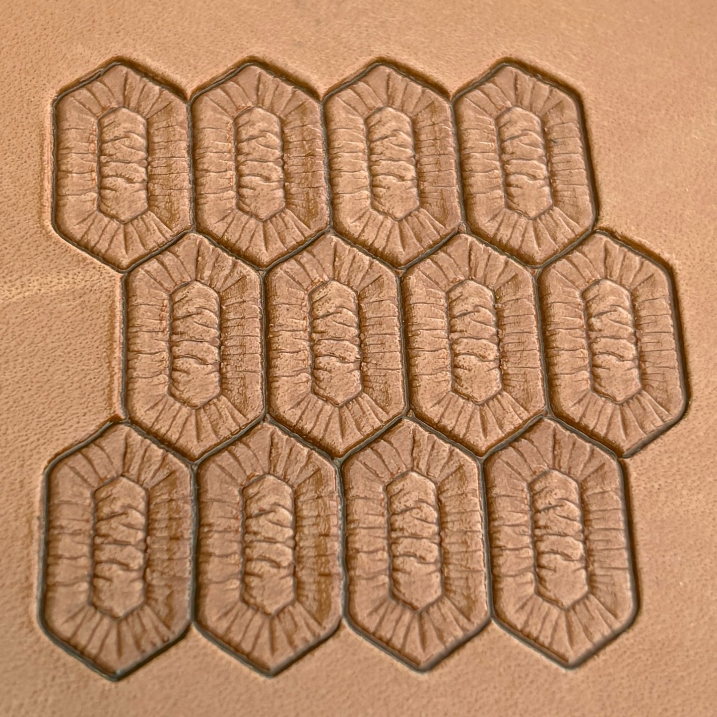 Geometric leather stamp LT029 — imprint on natural veg-tan leather