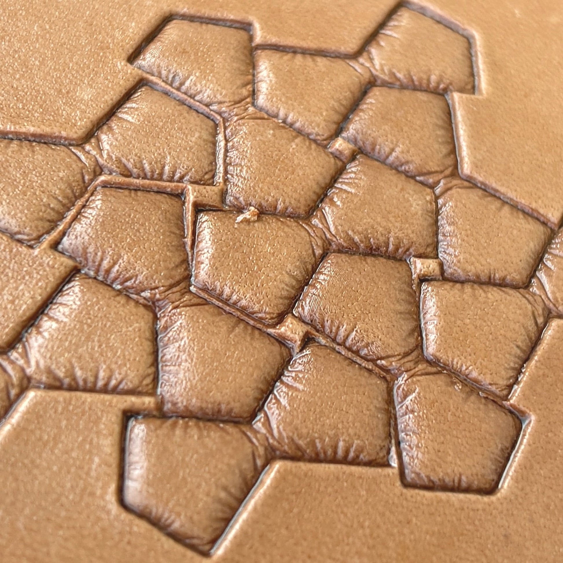 Geometric leather stamp LT031 — brass stamping tool with imprint on natural veg-tan leather