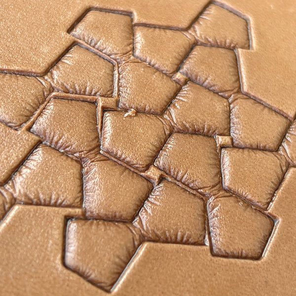 Geometric leather stamp LT031 — brass stamping tool with imprint on natural veg-tan leather