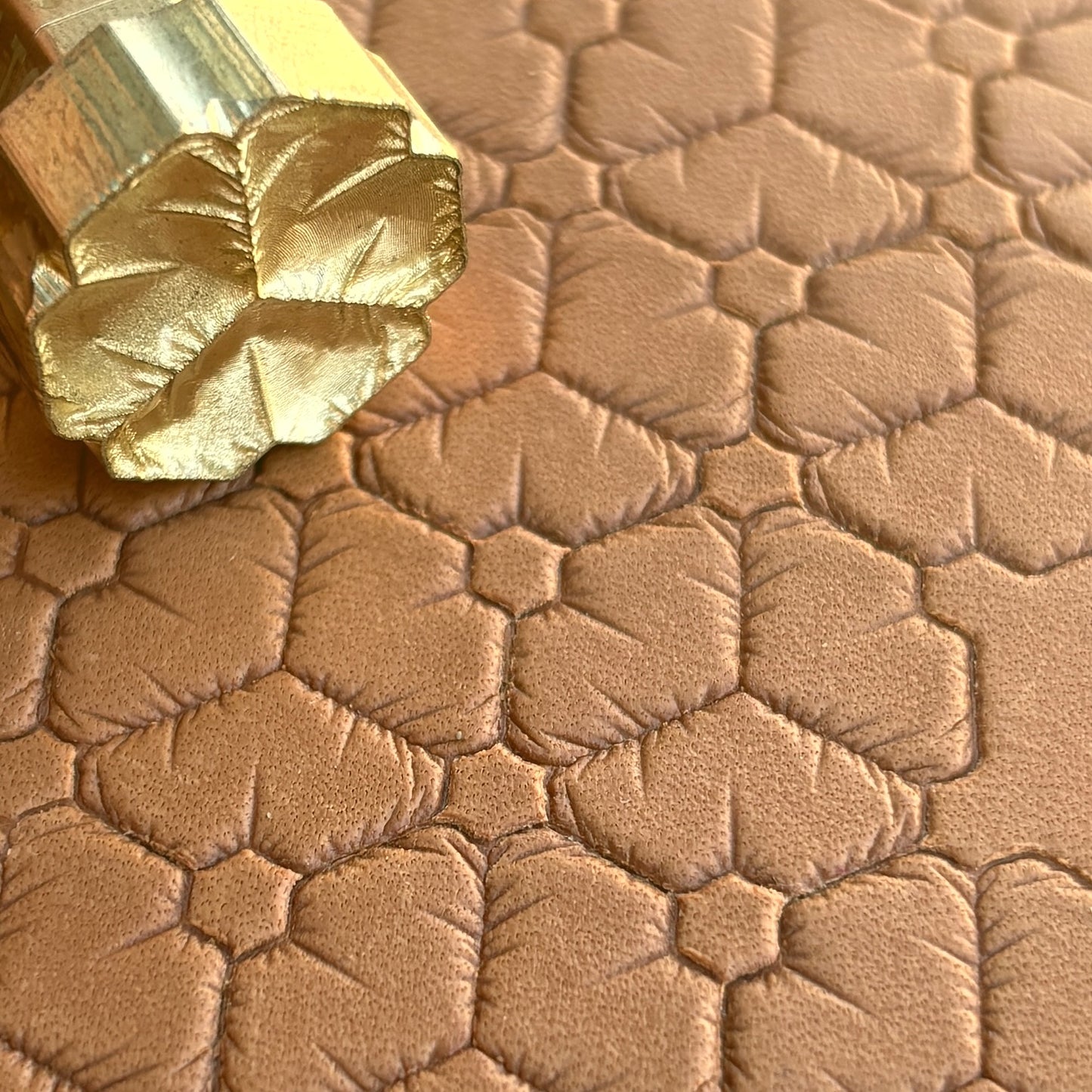 Honeycomb leather stamp LT032 — brass stamping tool with imprint on natural veg-tan leather