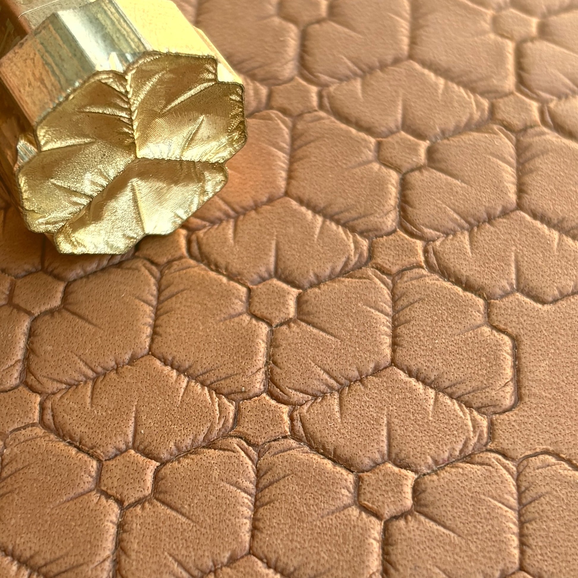 Honeycomb leather stamp LT032 — brass stamping tool with imprint on natural veg-tan leather