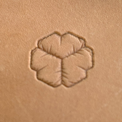 Honeycomb leather stamp LT032 — single impression on veg-tan leather