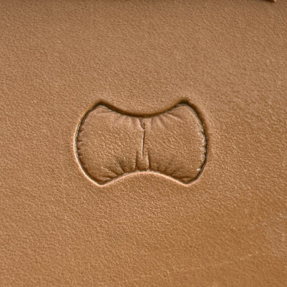 Scales leather stamp LT033 — single impression on veg-tan leather