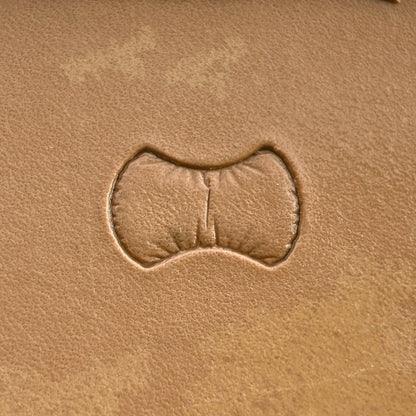 Scales leather stamp LT033 — single impression on veg-tan leather
