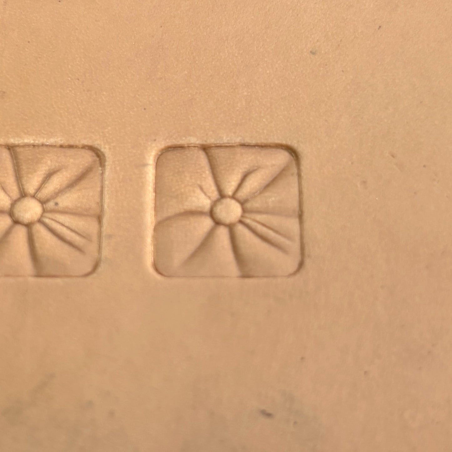 Geometric leather stamp LT034 — single impression on veg-tan leather