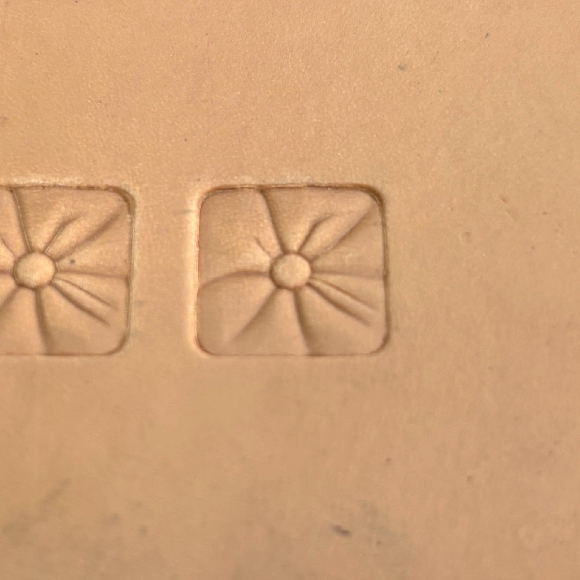 Geometric leather stamp LT034 — single impression on veg-tan leather