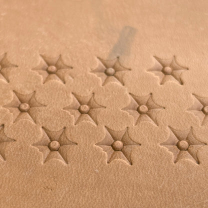 Starburst leather stamp LT035 — pattern imprint on veg-tan leather