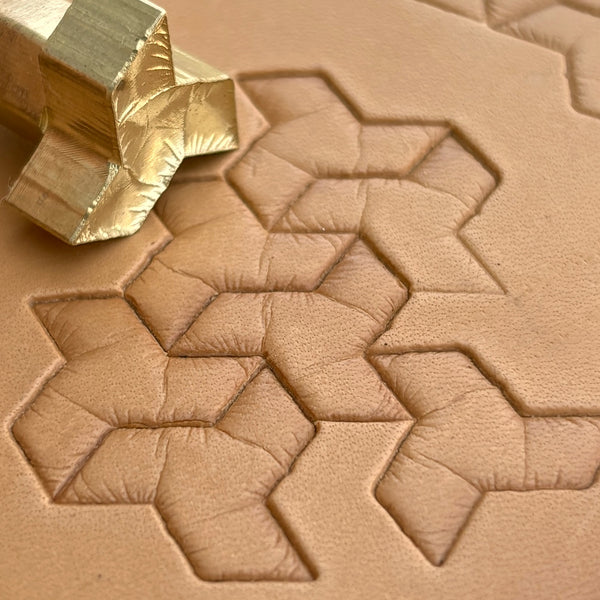 Geometric leather stamp LT036 — brass stamping tool with imprint on natural veg-tan leather