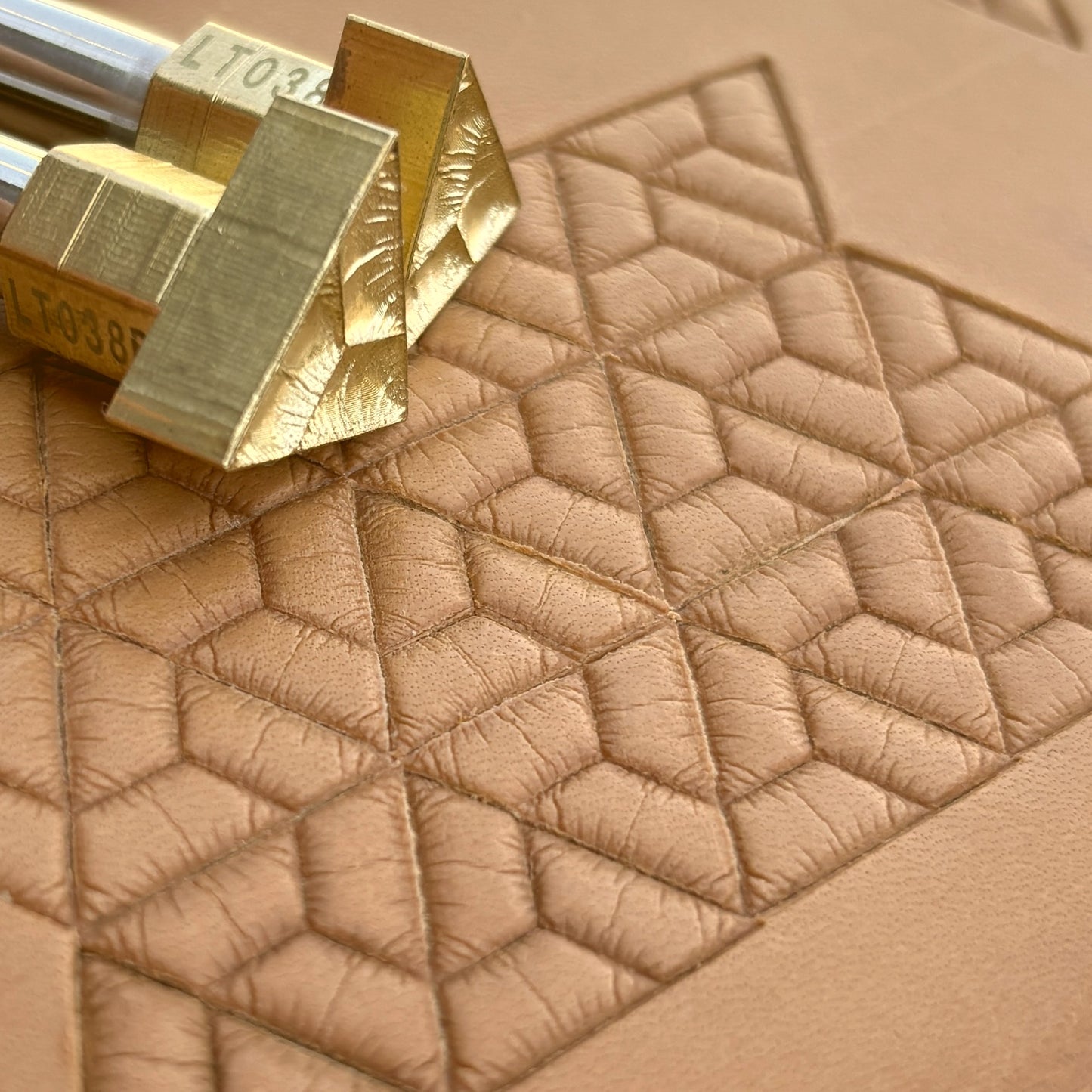 Geometric leather stamp LT038 — brass stamping tool with imprint on natural veg-tan leather