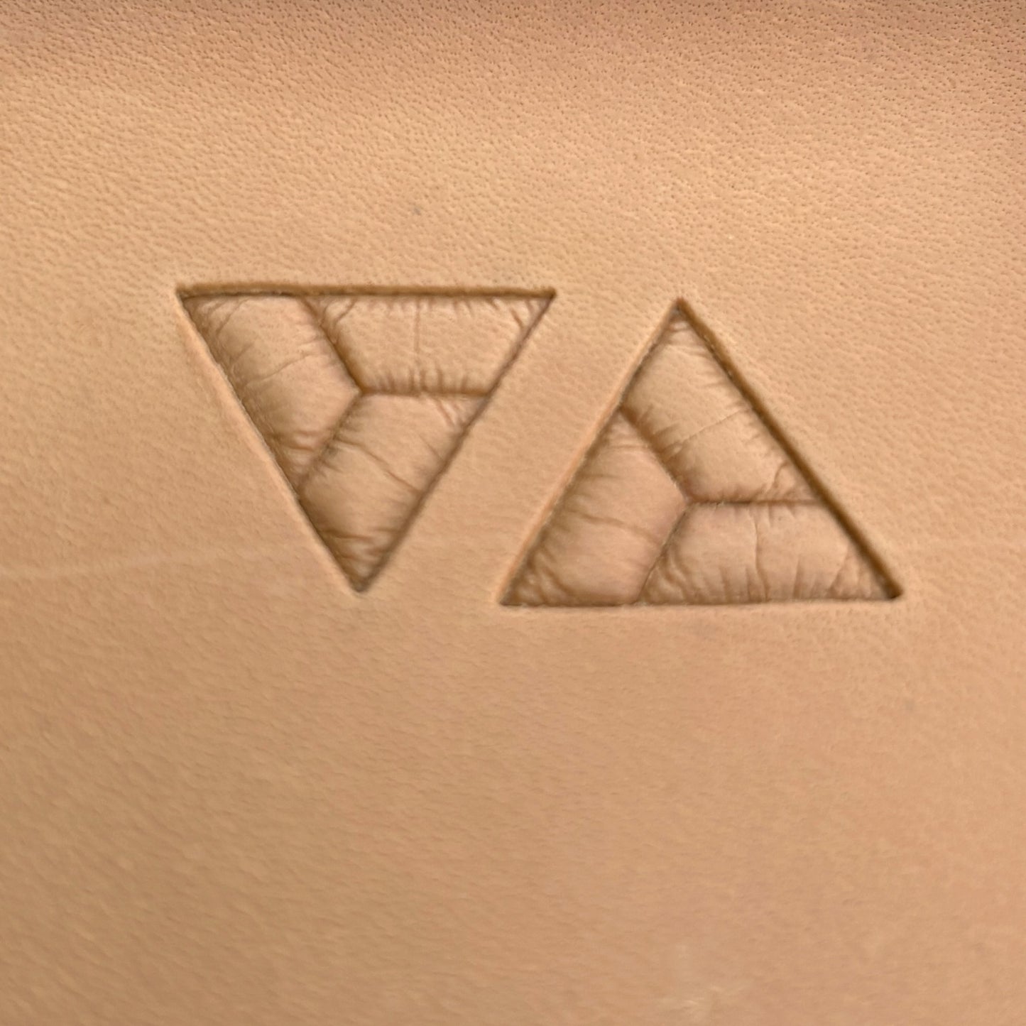 Geometric leather stamp LT038 — single impression on veg-tan leather