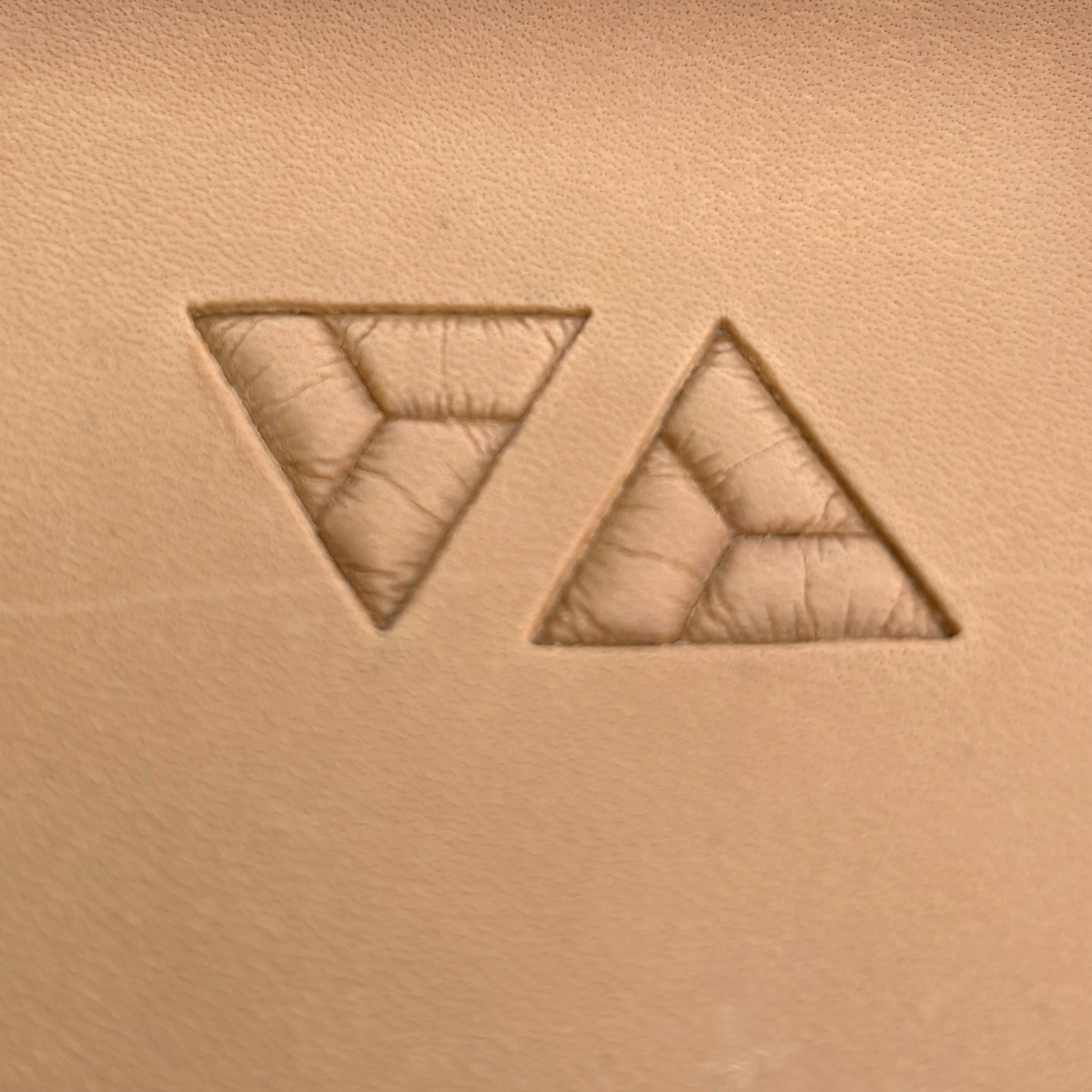Geometric leather stamp LT038 — single impression on veg-tan leather