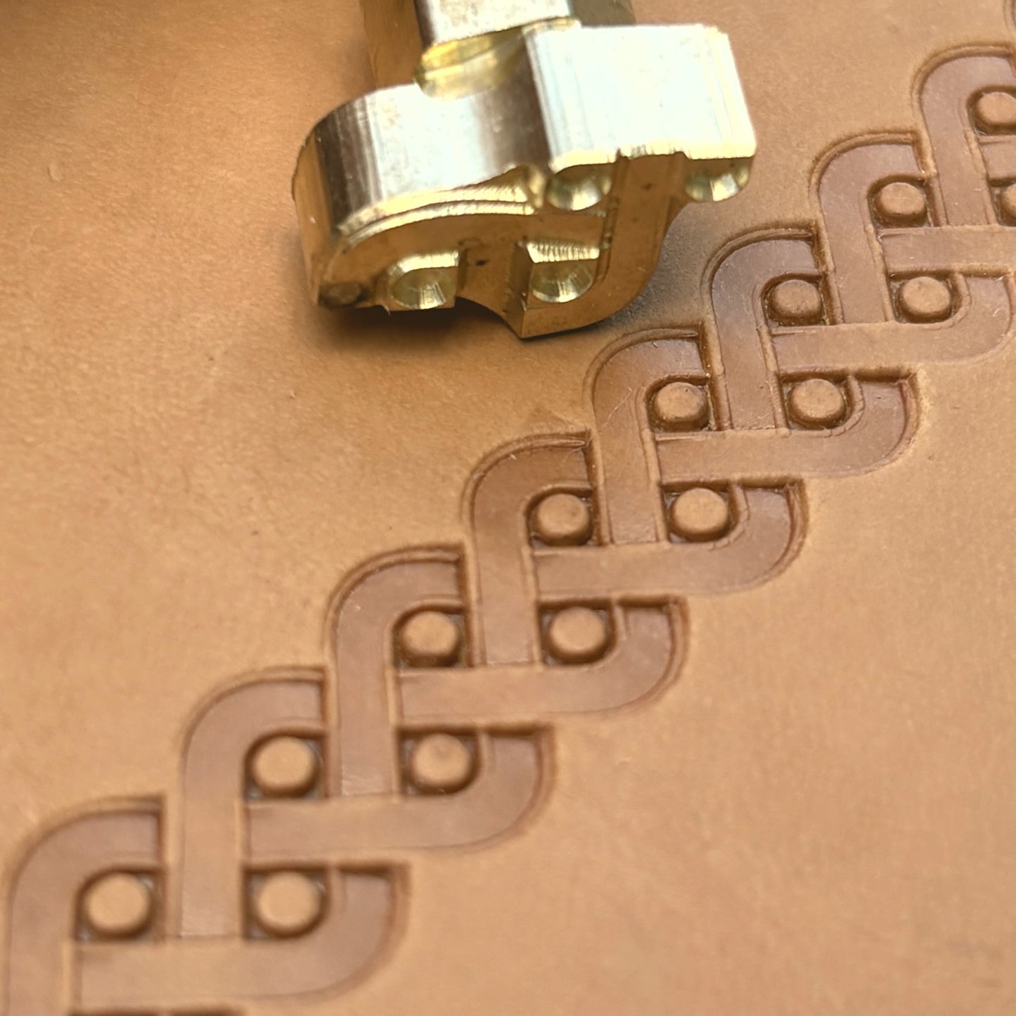 Celtic Weave leather stamp LT042 — brass stamping tool with imprint on natural veg-tan leather