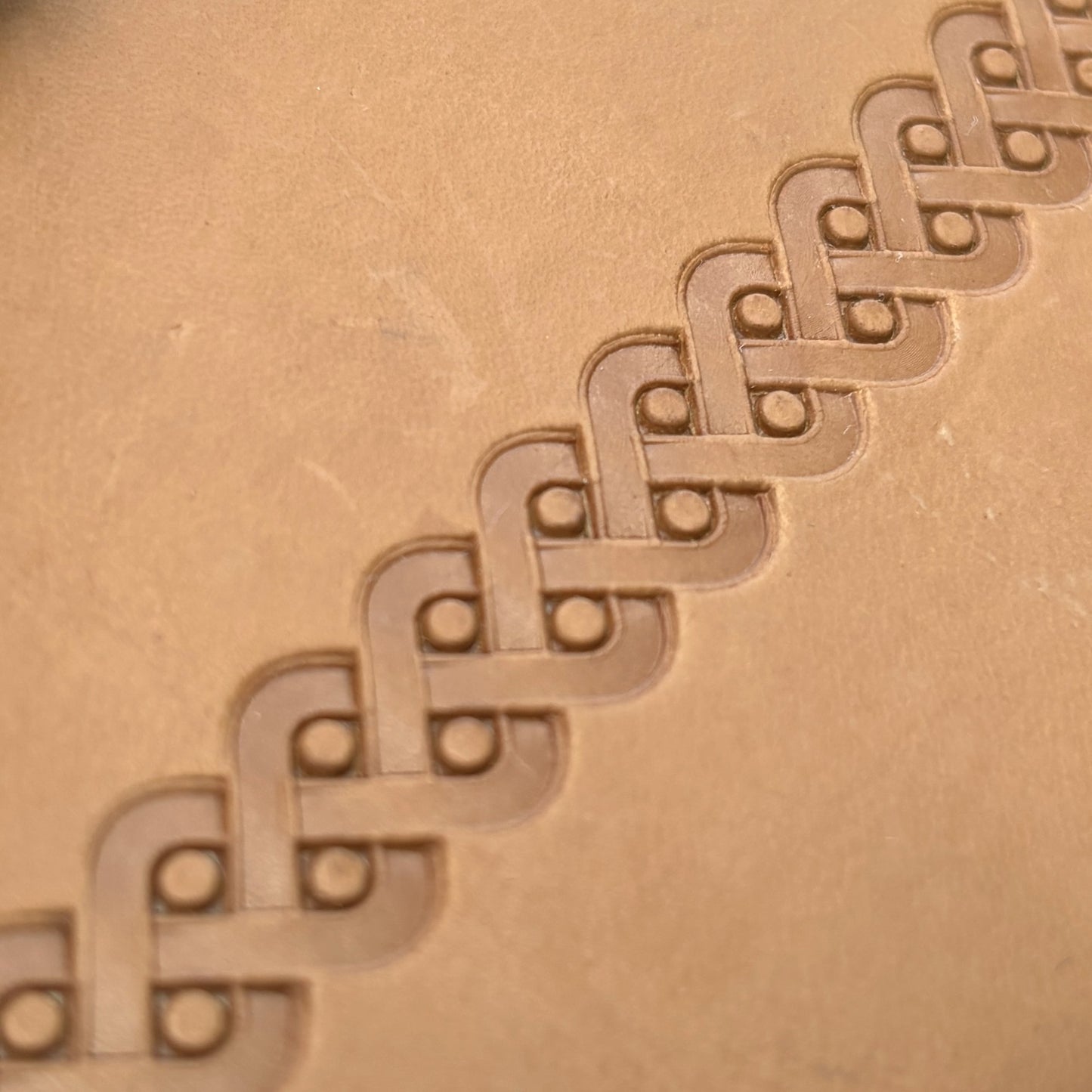 Celtic Weave leather stamp LT042 — border pattern imprint on veg-tan leather