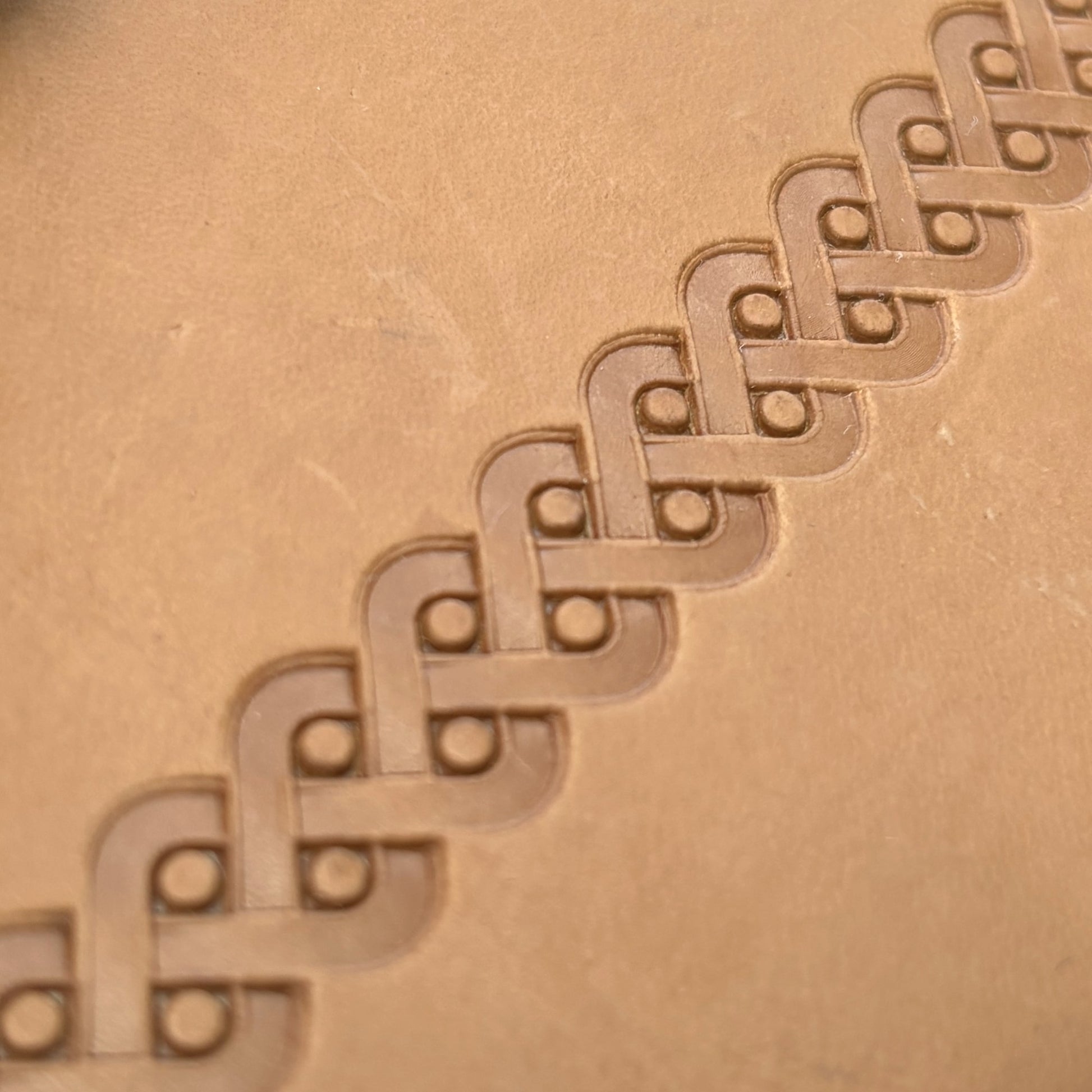 Celtic Weave leather stamp LT042 — border pattern imprint on veg-tan leather