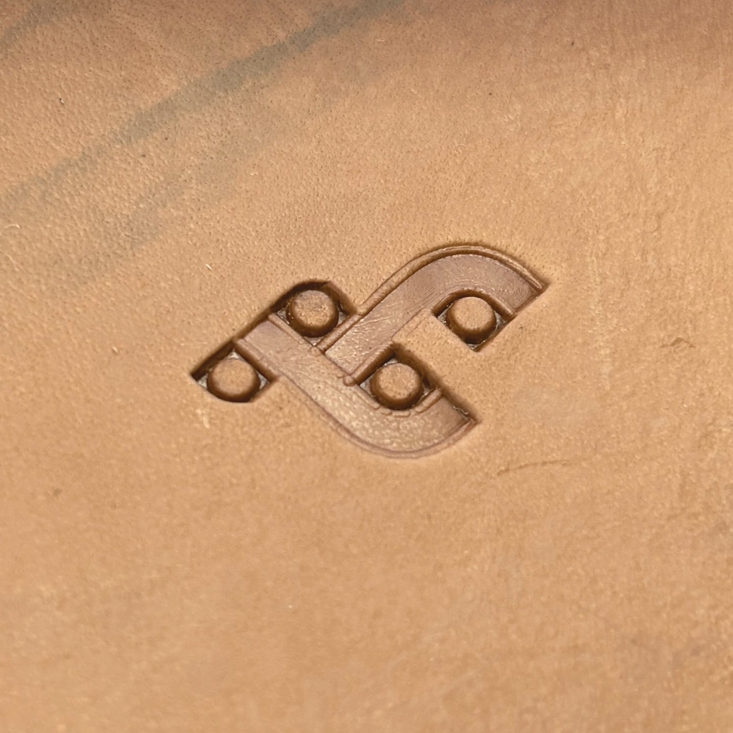 Celtic Weave leather stamp LT042 — single impression on veg-tan leather