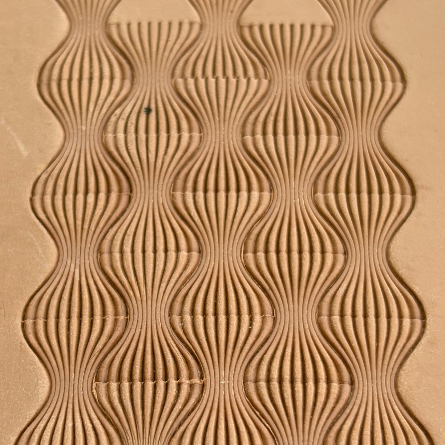 Wavy Lines leather stamp LT044 — pattern imprint on veg-tan leather