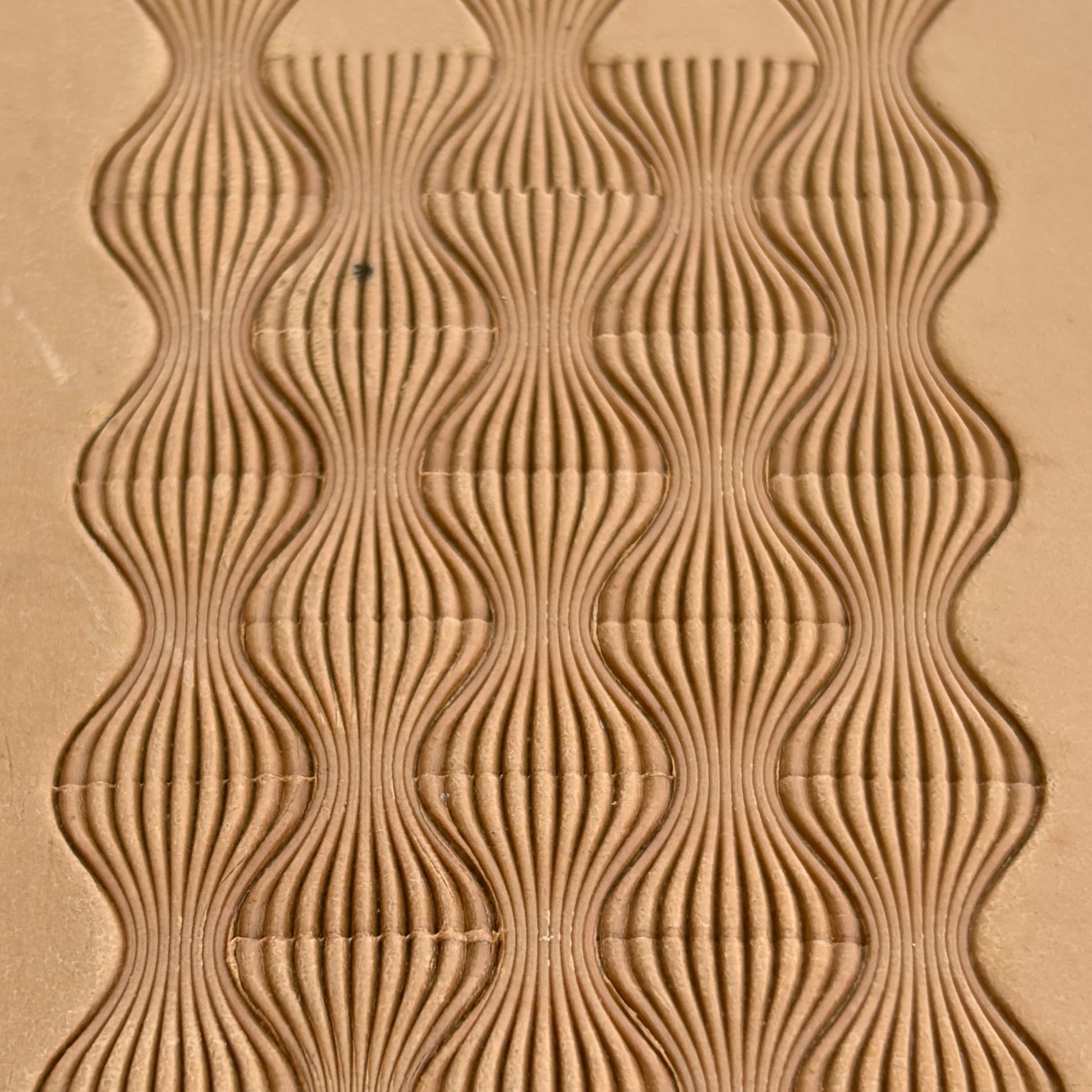 Wavy Lines leather stamp LT044 — pattern imprint on veg-tan leather