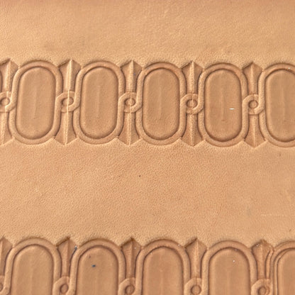 Oval Border leather stamp LT045 — pattern imprint on veg-tan leather