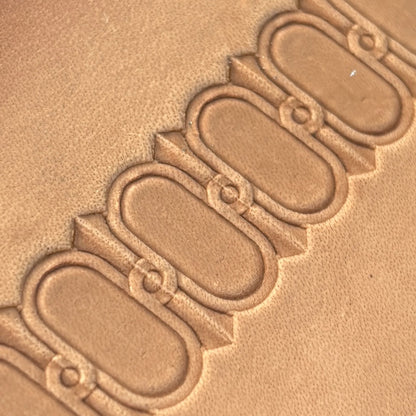 Oval Border leather stamp LT045 — pattern imprint on veg-tan leather