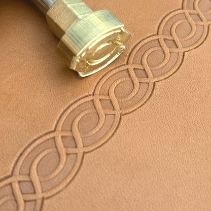 Geometric leather stamp LT047 — brass stamping tool with imprint on natural veg-tan leather