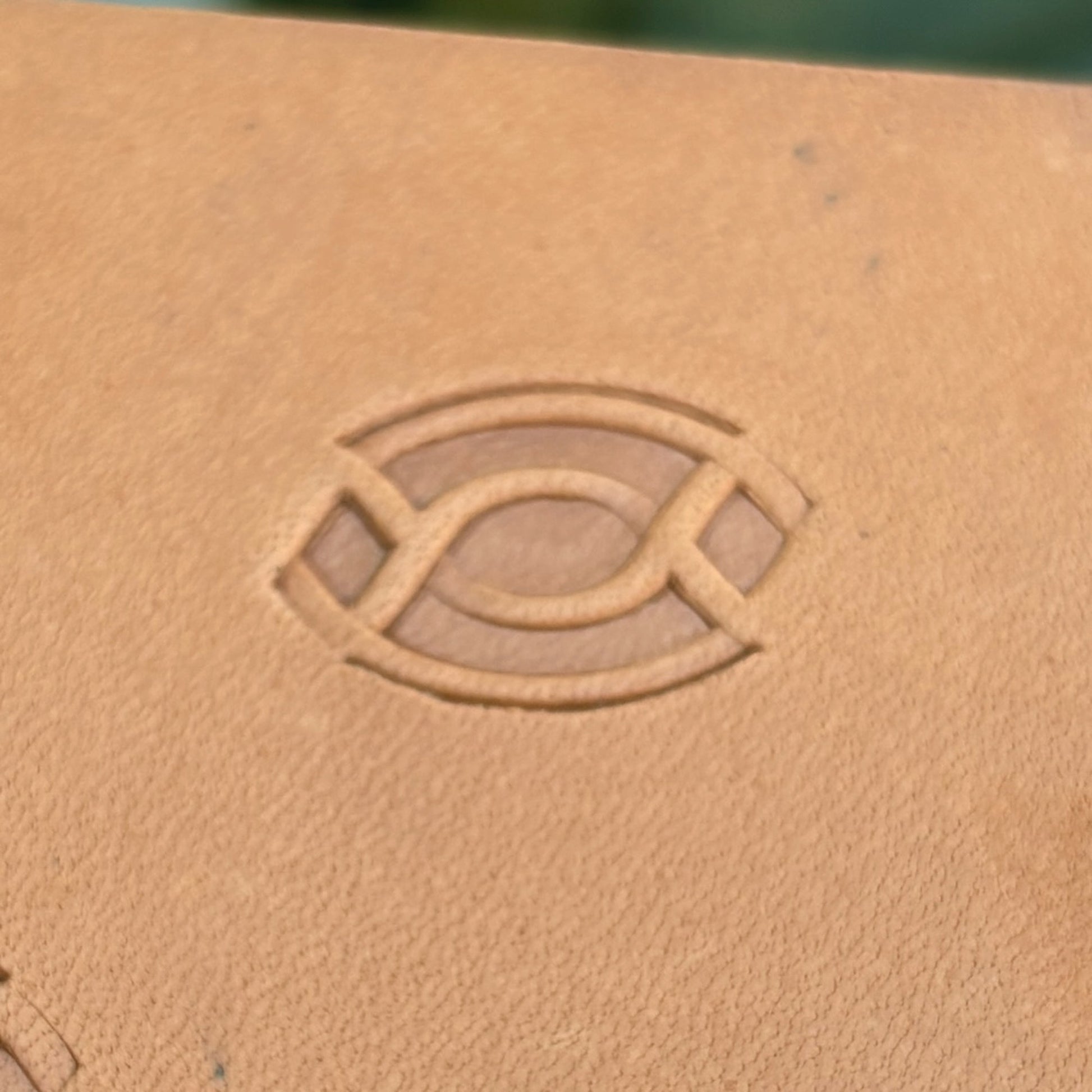 Geometric leather stamp LT047 — single impression on veg-tan leather