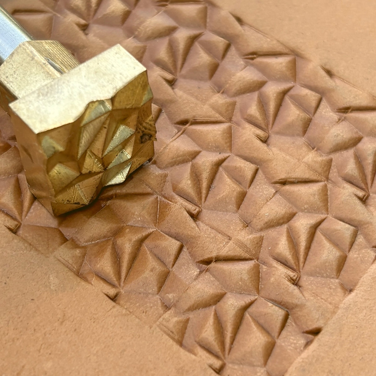 Origami Style Geometric leather stamp LT051 — brass stamping tool with imprint on natural veg-tan leather