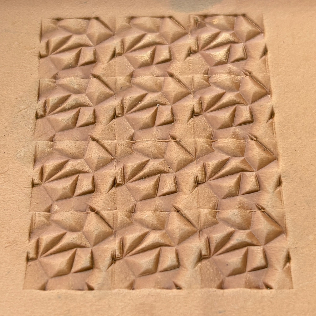 Origami Style Geometric leather stamp LT051 — pattern imprint on veg-tan leather