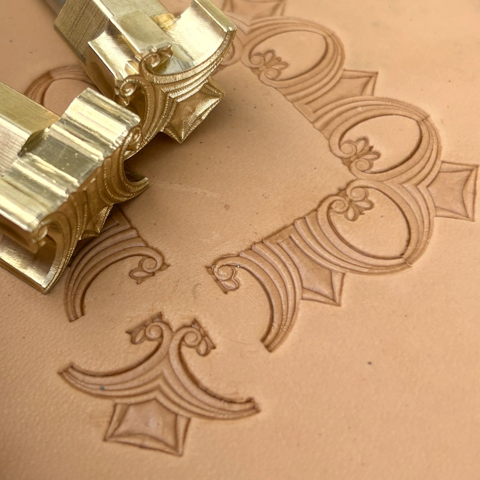 Art Deco Geometric leather stamp LT053 — brass stamping tool with imprint on natural veg-tan leather