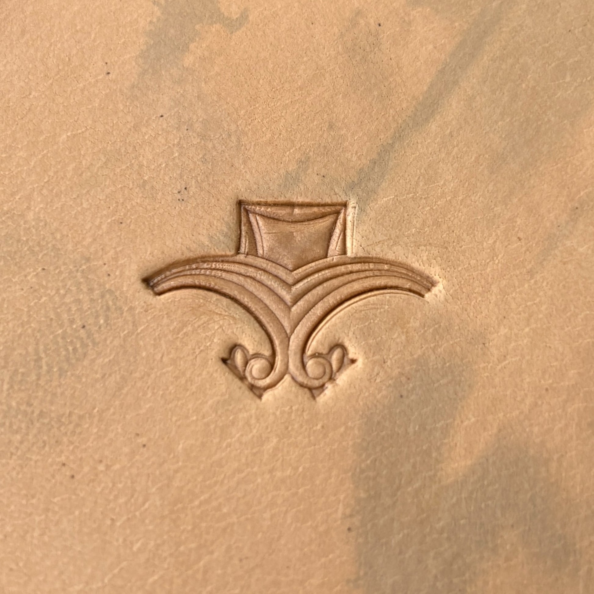 Art Deco Geometric leather stamp LT053 — single impression on veg-tan leather