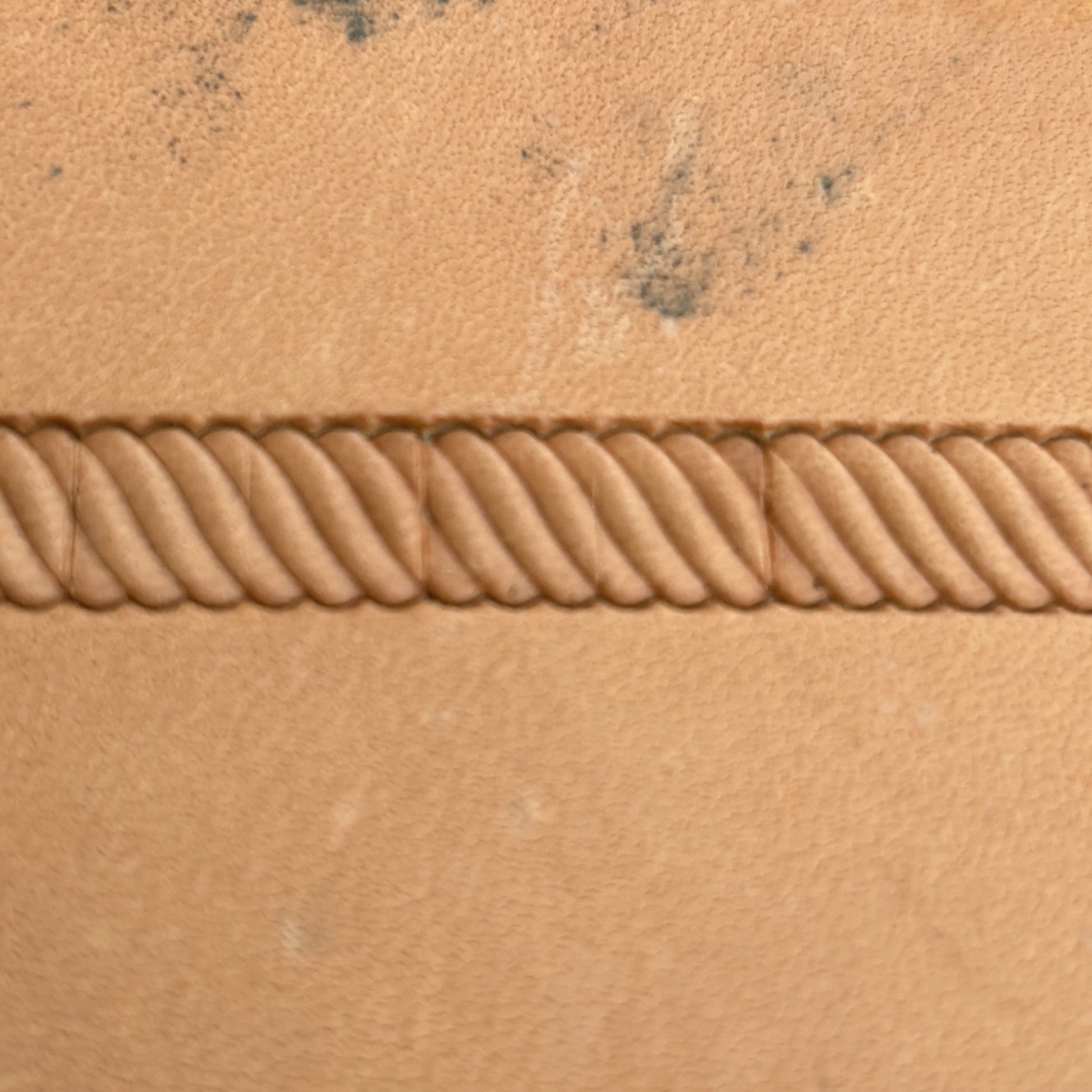 Stitches leather stamp LT057 — pattern imprint on veg-tan leather