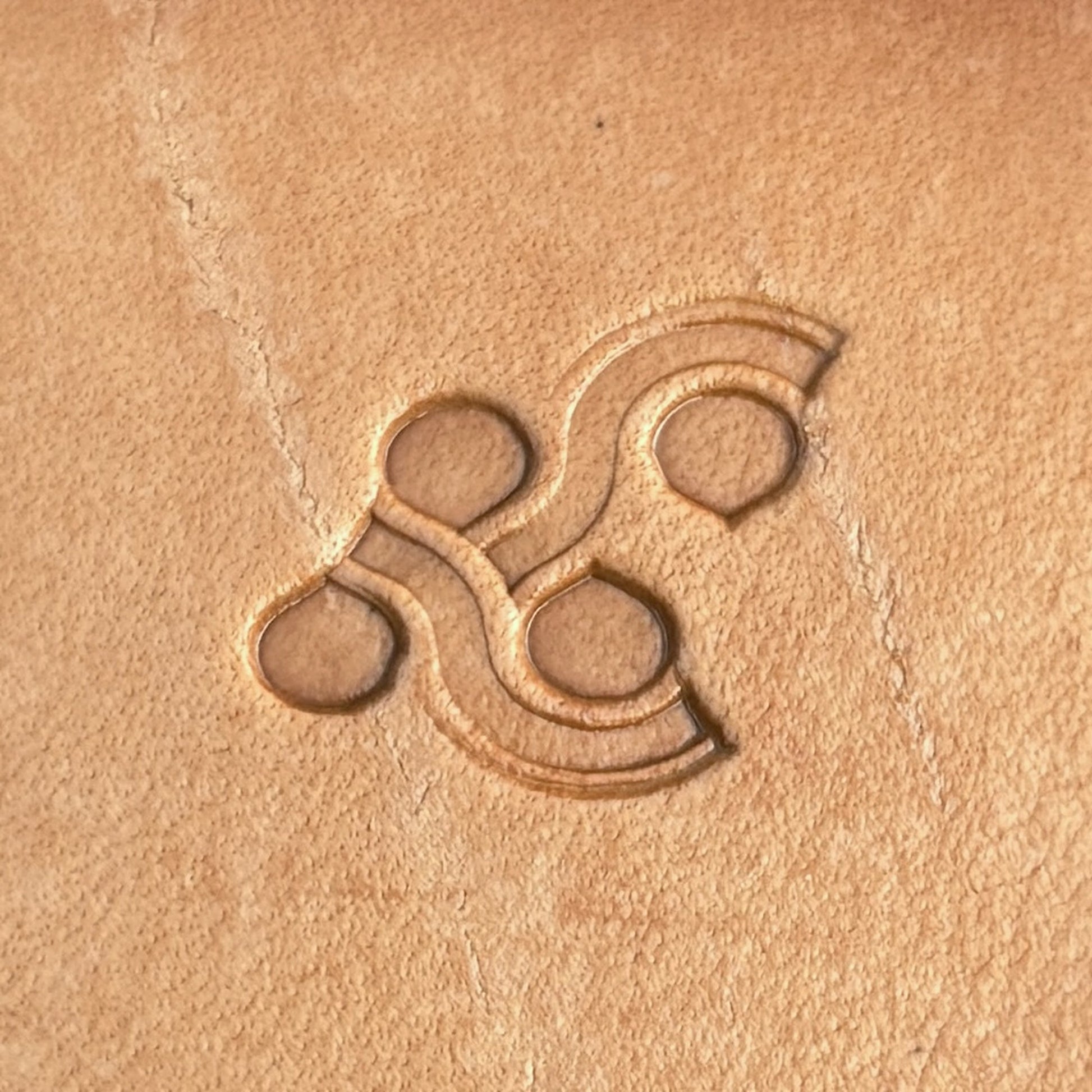 Celtic Knot Geometric leather stamp LT060 — single impression on veg-tan leather