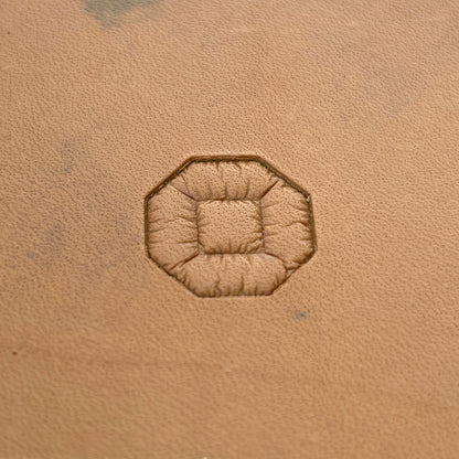 Octagon Cluster Geometric leather stamp LT061 — single impression on veg-tan leather