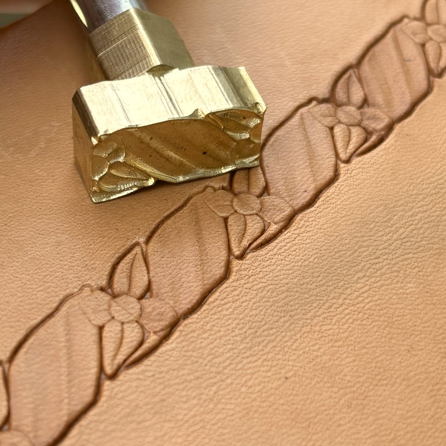 Floral Border leather stamp LT065 — brass stamping tool with imprint on natural veg-tan leather