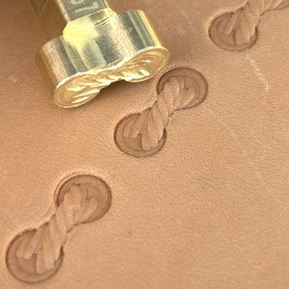 Geometric leather stamp LT067 — brass stamping tool with imprint on natural veg-tan leather