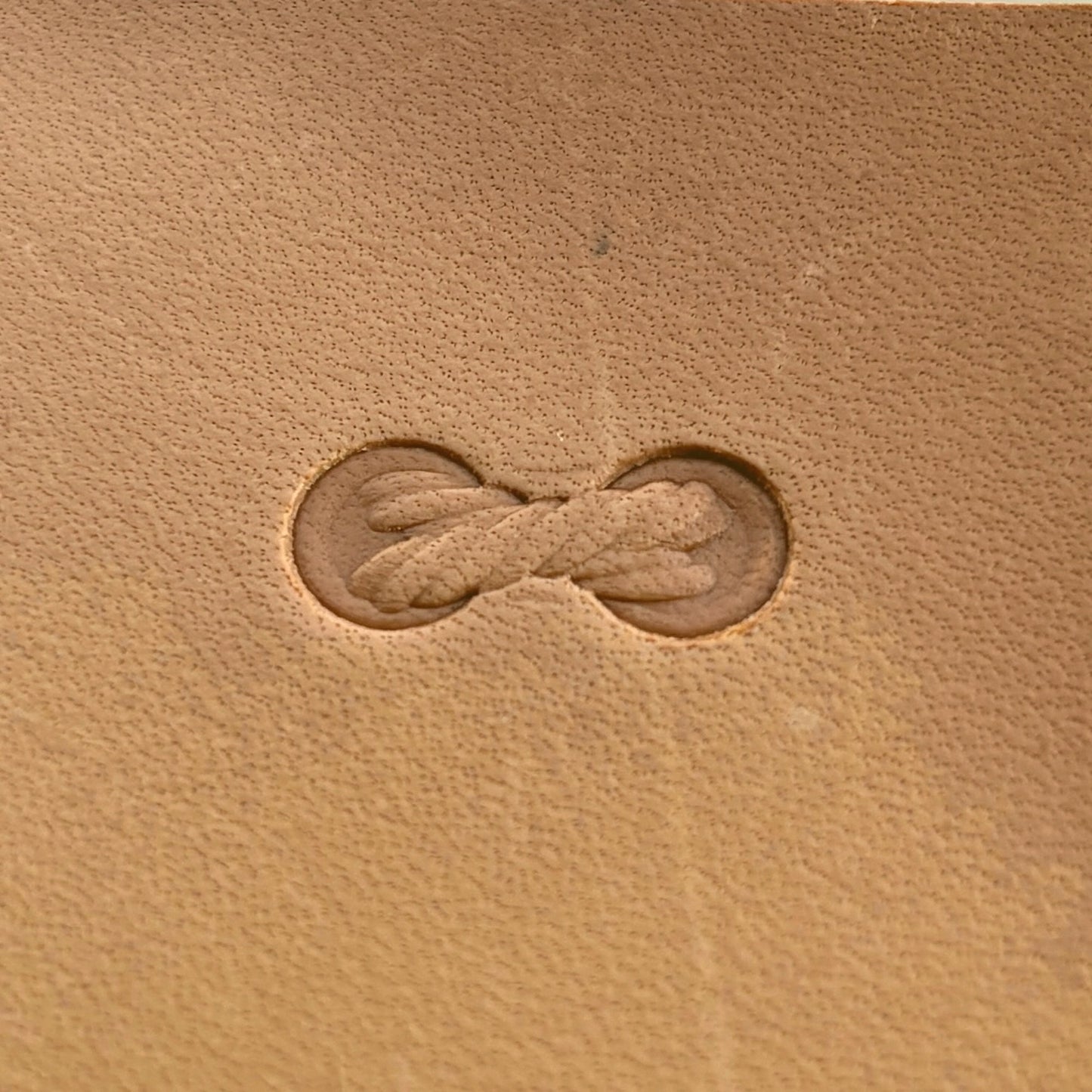 Geometric leather stamp LT067 — single impression on veg-tan leather