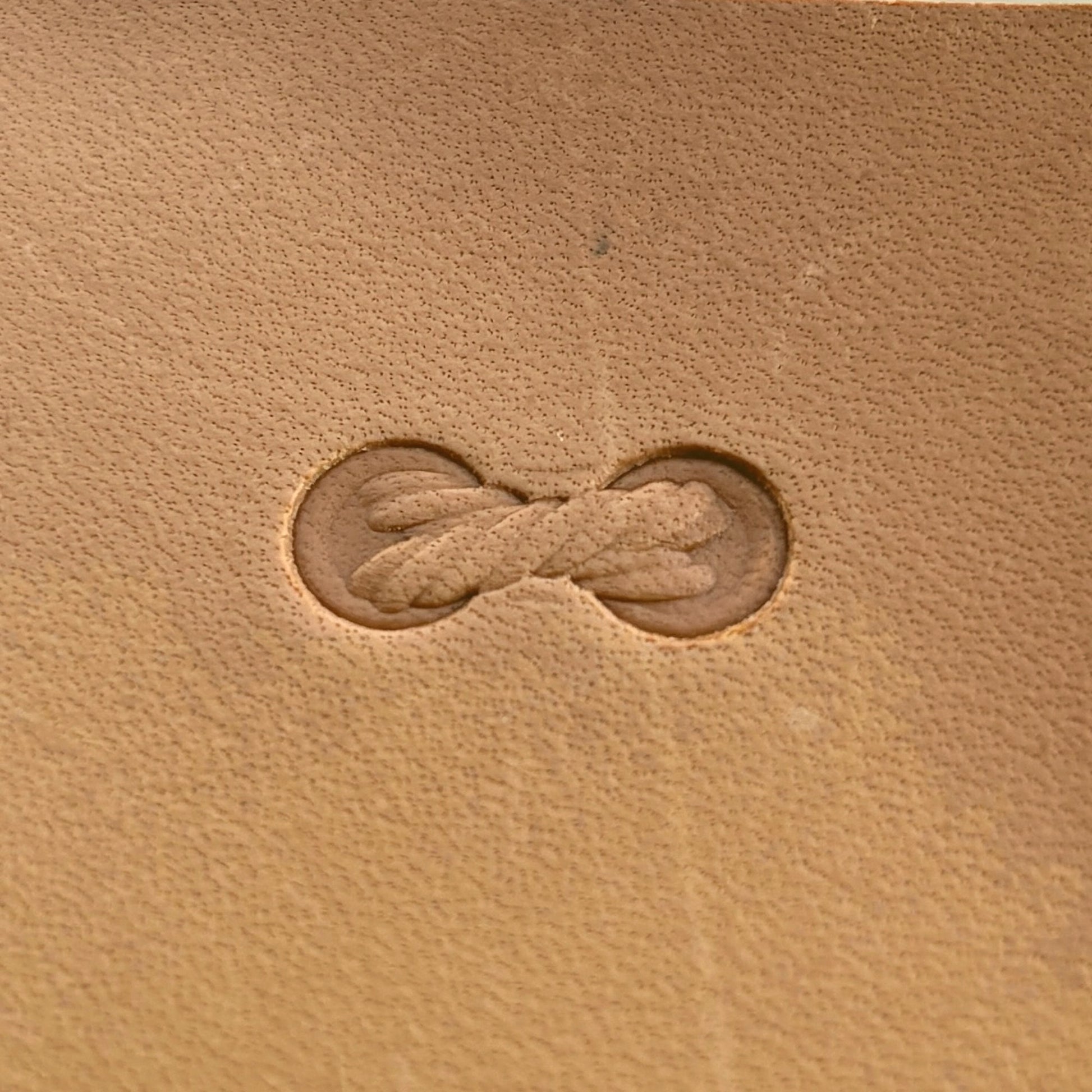 Geometric leather stamp LT067 — single impression on veg-tan leather