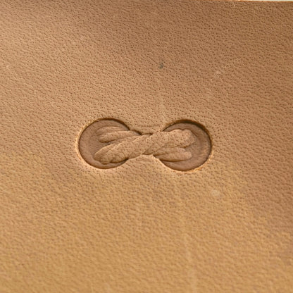 Geometric leather stamp LT067 — single impression on veg-tan leather