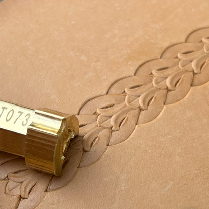 Border Leaf leather stamp LT073 — brass stamping tool with imprint on natural veg-tan leather