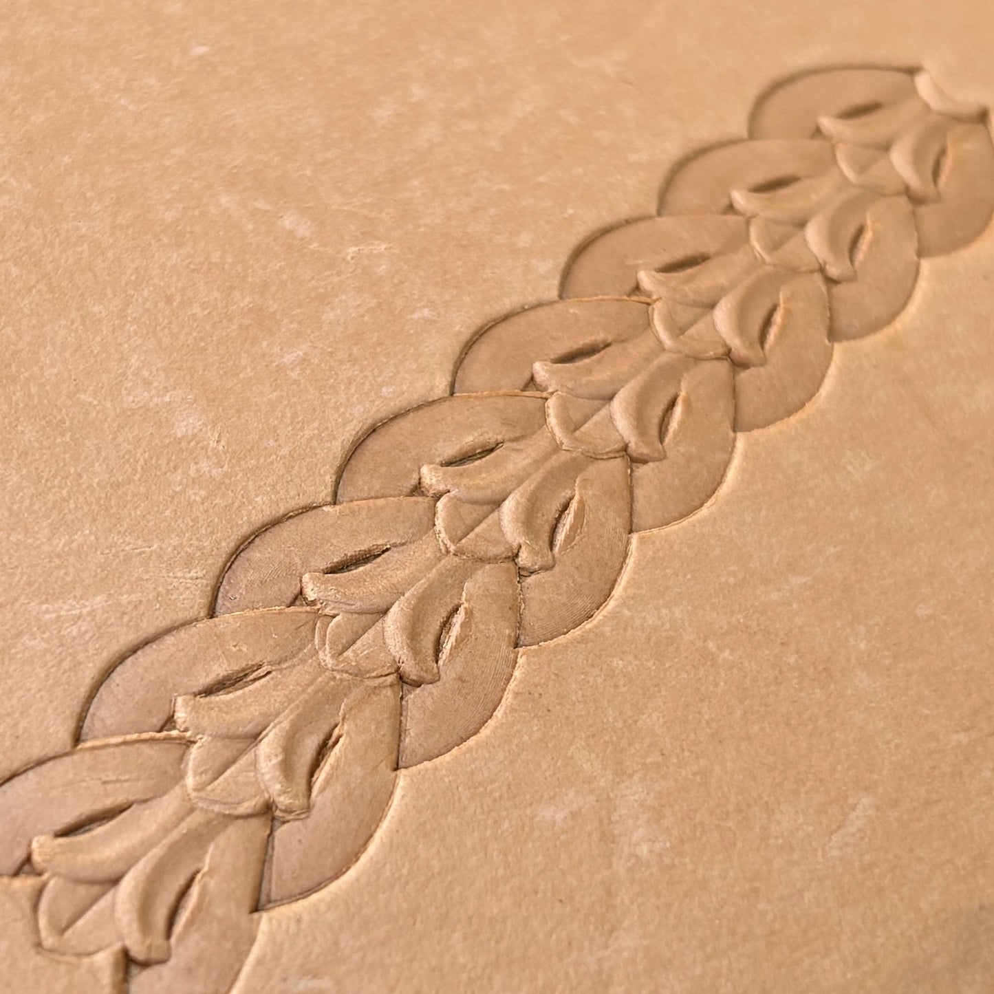 Border Leaf leather stamp LT073 — pattern imprint on veg-tan leather