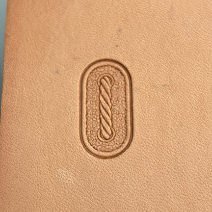 Rope Oval leather stamp LT074 — single impression on veg-tan leather