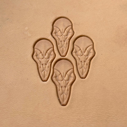 Alien Skull leather stamp LT077 — single impression on veg-tan leather