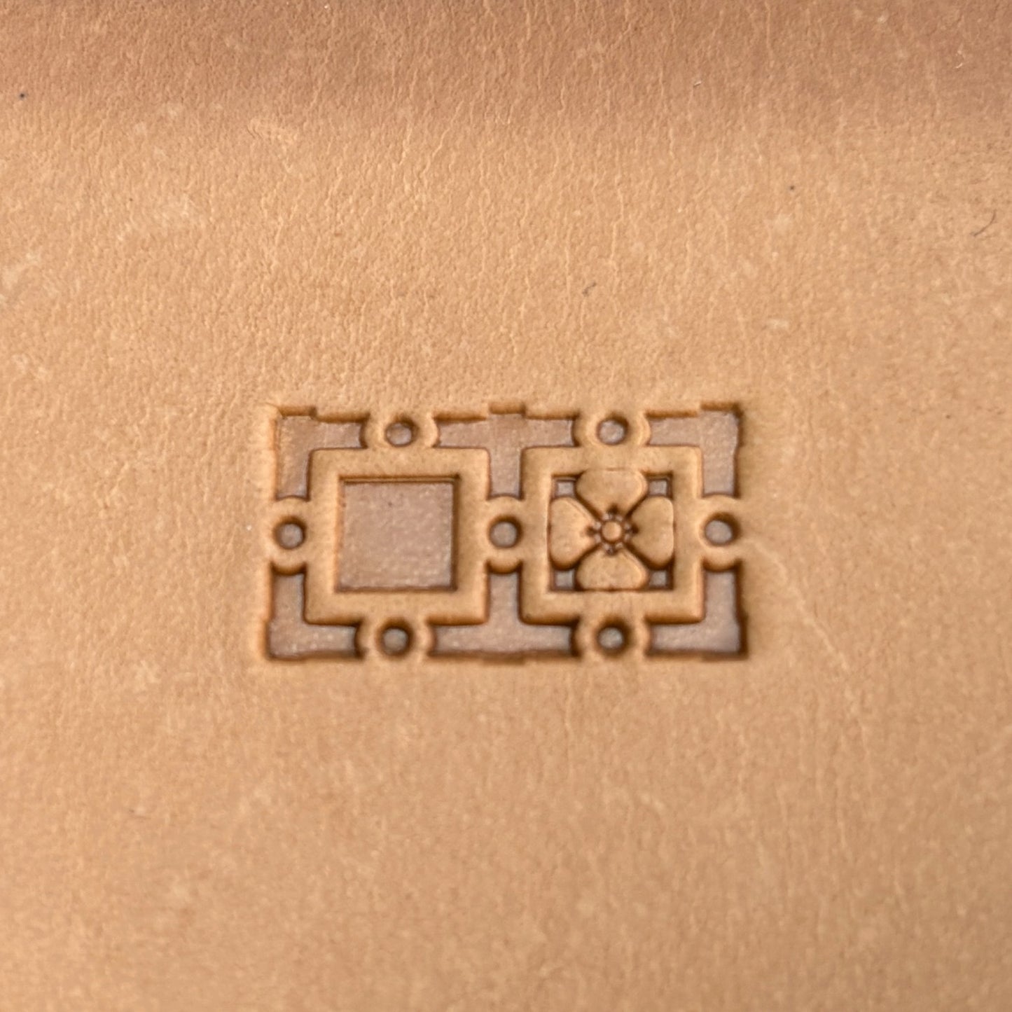 Geometric leather stamp LT081 — single impression on veg-tan leather