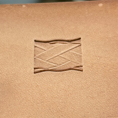 Braided Band leather stamp LT083 — single impression on veg-tan leather