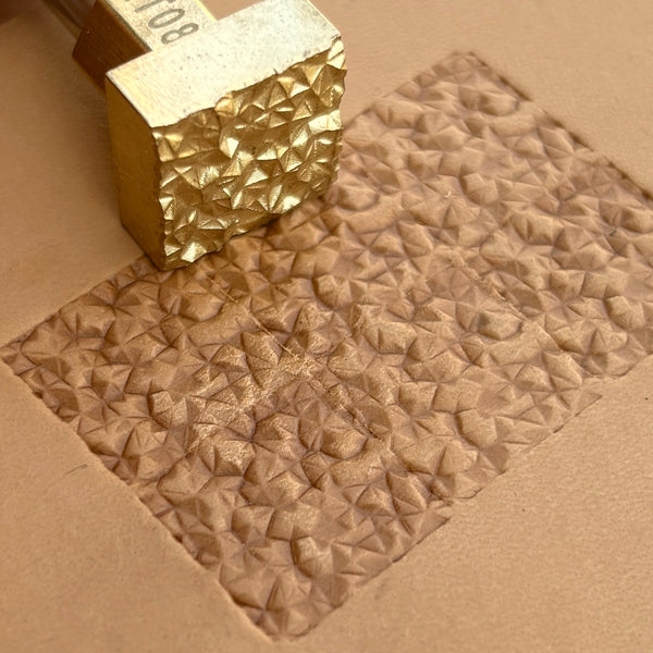 Geometric leather stamp LT085 — brass stamping tool with imprint on natural veg-tan leather