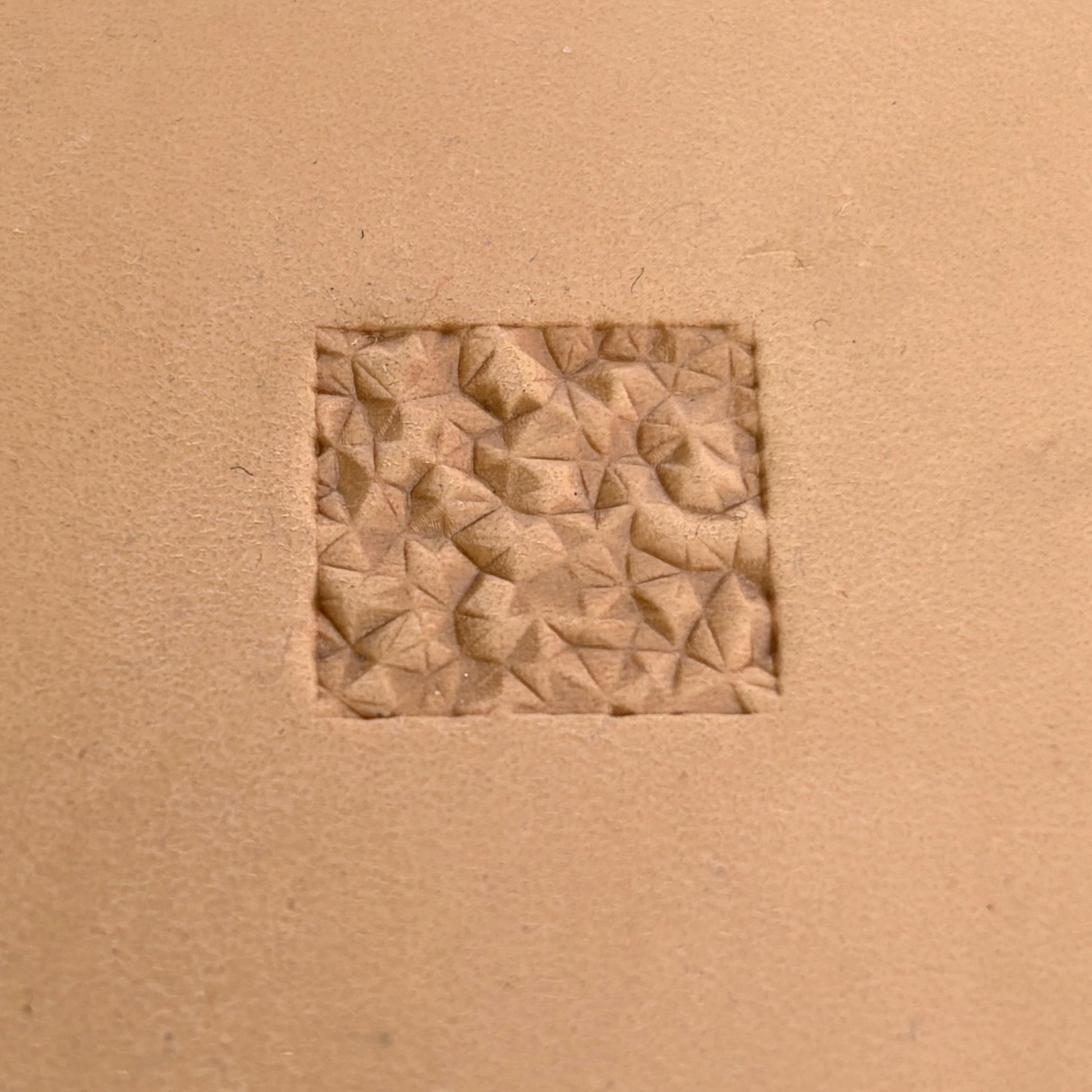 Geometric leather stamp LT085 — pattern imprint on veg-tan leather