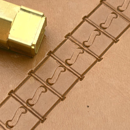 Boxed Line Stitches leather stamp LT087 — brass stamping tool with imprint on natural veg-tan leather