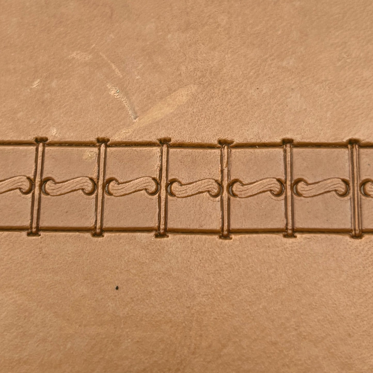 Boxed Line Stitches leather stamp LT087 — pattern imprint on veg-tan leather