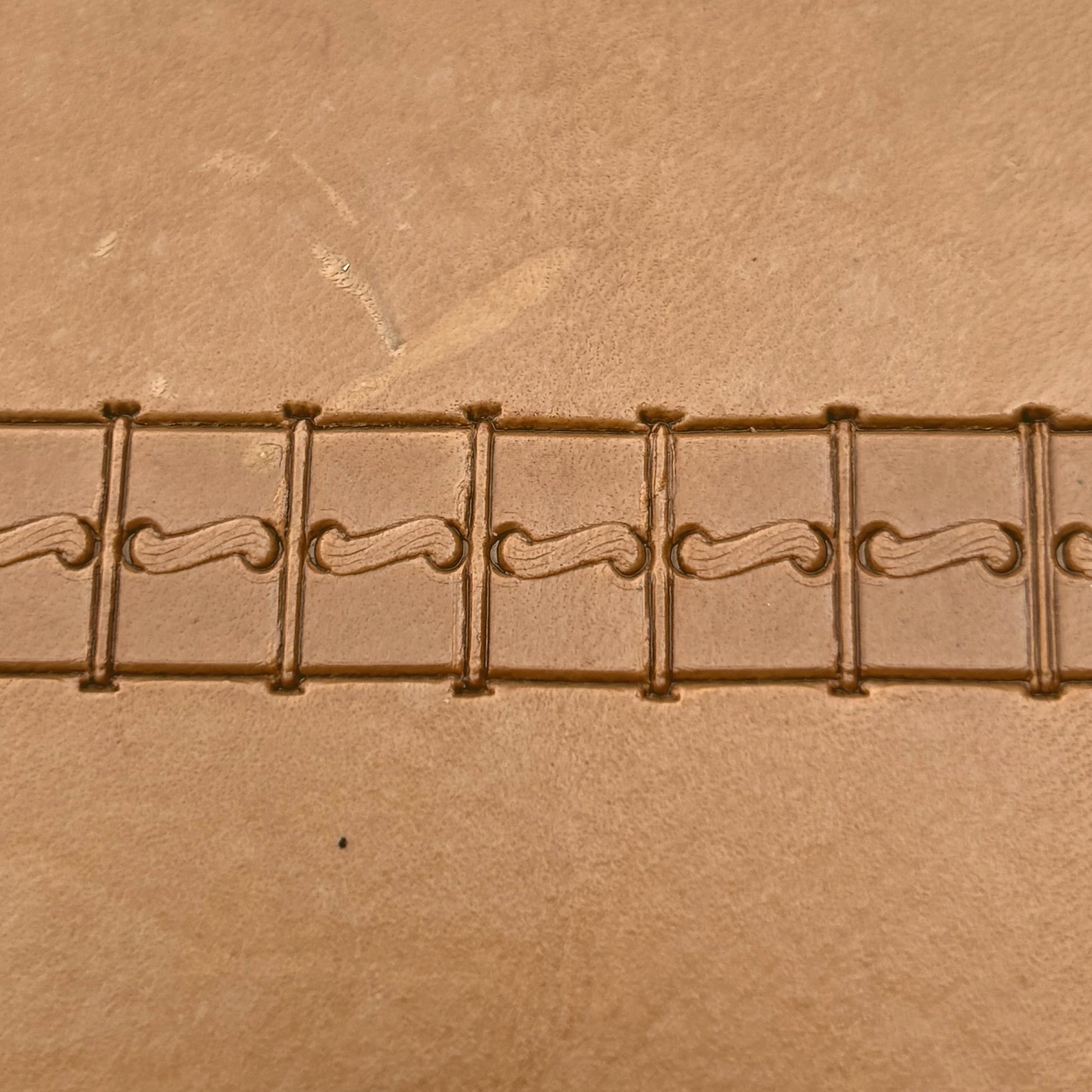Boxed Line Stitches leather stamp LT087 — pattern imprint on veg-tan leather