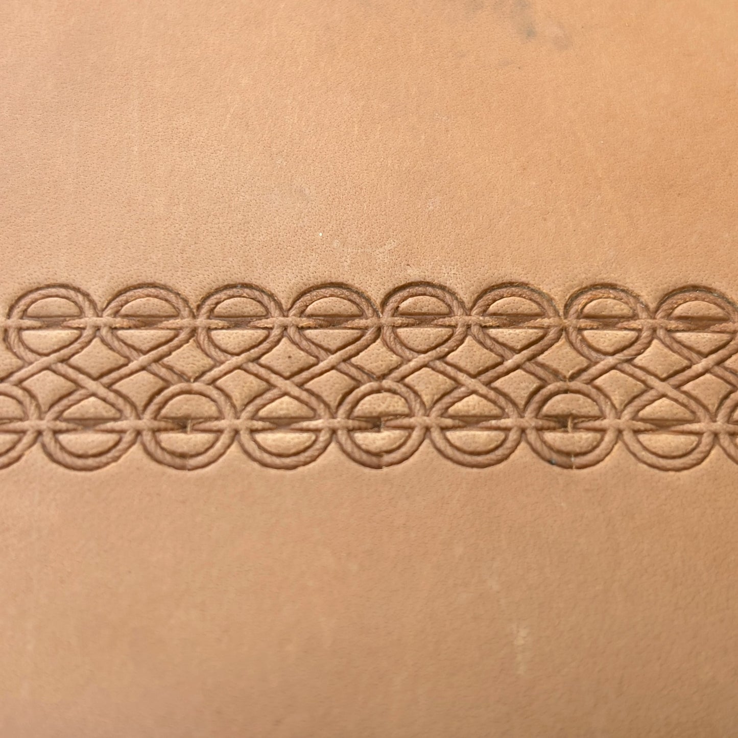 Interlocking Lines leather stamp LT090 — pattern imprint on veg-tan leather
