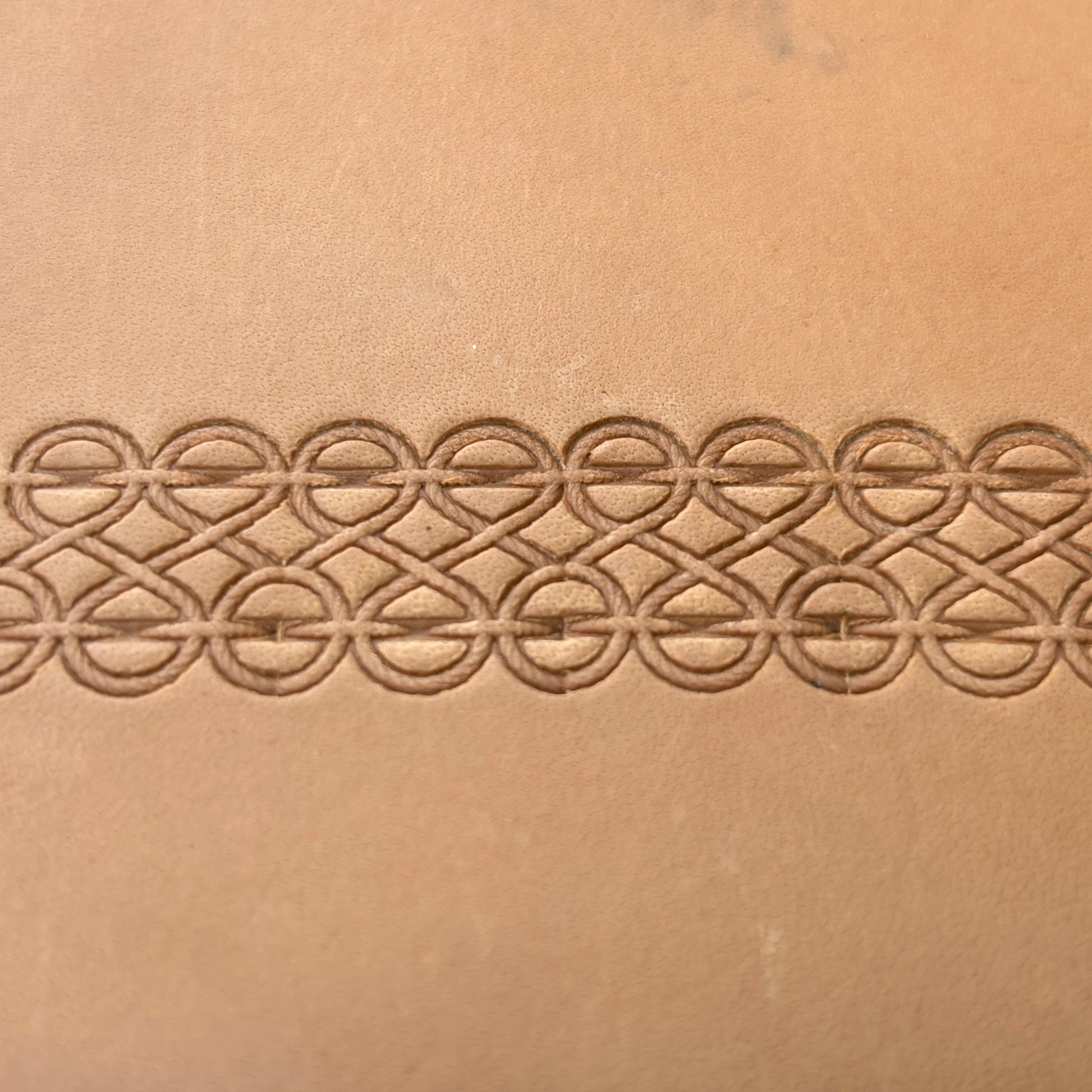 Interlocking Lines leather stamp LT090 — pattern imprint on veg-tan leather
